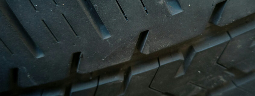 Close up of a distressed tire tread